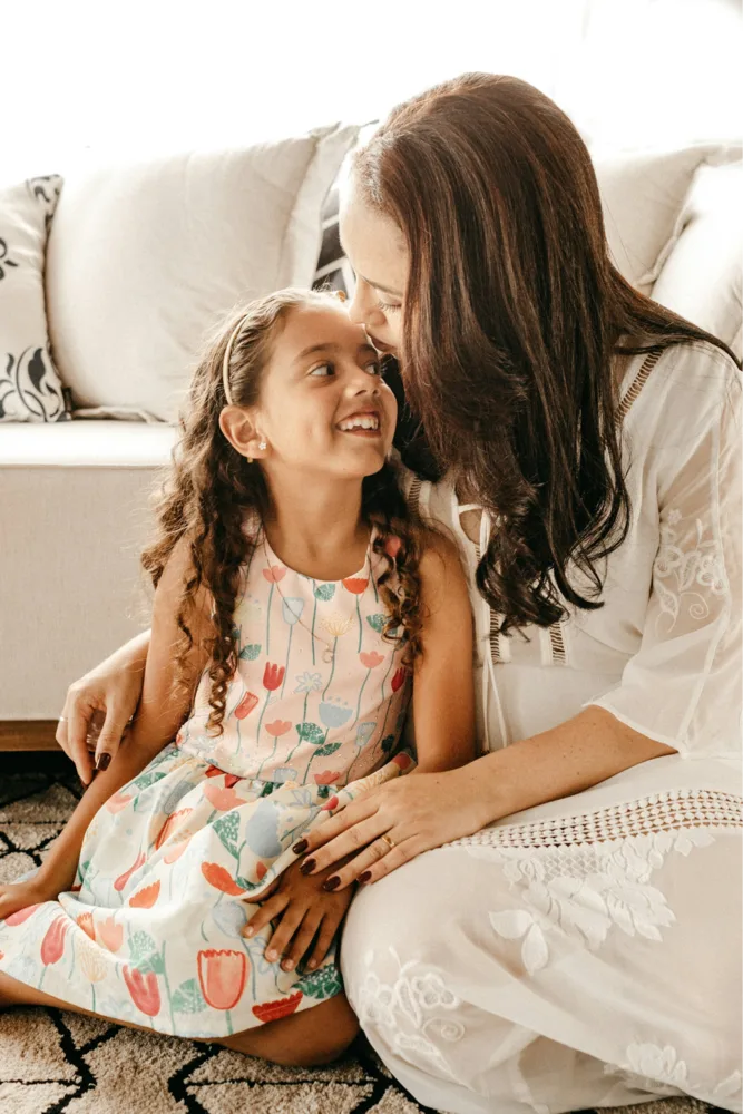 Mother and daughter enjoying music together